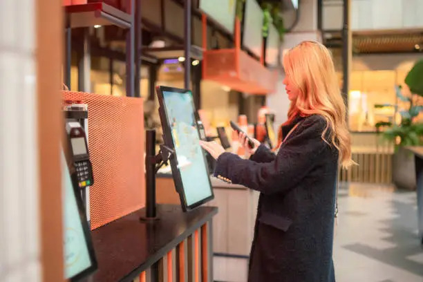 Explore how intelligent kiosk solutions and digital transformation are reshaping the fast-food industry, enhancing efficiency, and adapting to rising minimum wages.