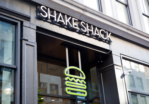 Explore how Shake Shack focuses on improving operational efficiency, particularly in drive-thru services, to enhance customer experience and maintain profitability.